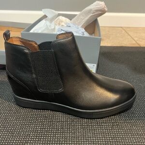 Vionic wedge booties.